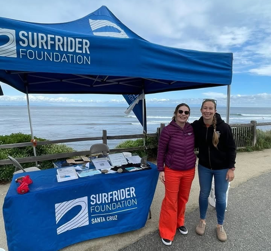 Asm. Addis in front of Surfrider Foundation booth with staffer