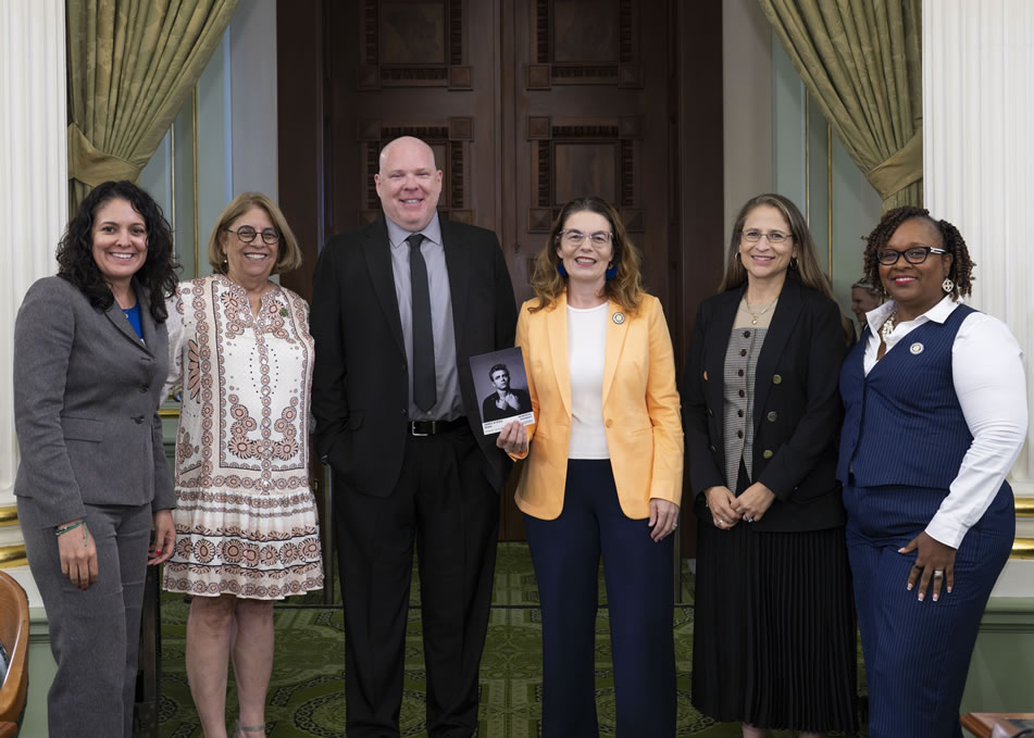 Asm. Addis and other members with Neil Sheehan on the Assembly Floor