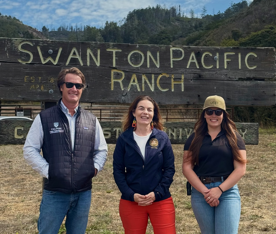 Asm. Addis, Jeremy James and Emily Steffenhagen standing in front of Swanton Pacific sign