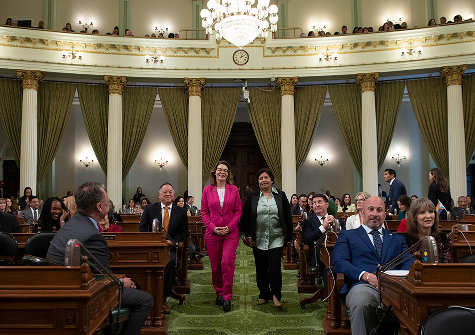 Asm. Addis escorting Francisca Arroyo Rosales on the Assembly Floor