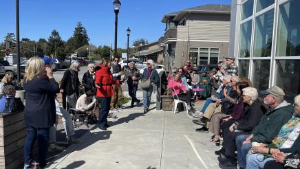 Asm. Addis speaking with coffee chat attendees in Aptos