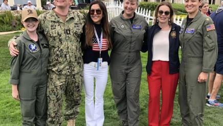 Asm. Addis with all-female flight crew at Navy flyover, celebrating 50 years of women flying in the Navy