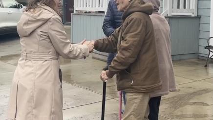 Asm. Addis shaking hands with senior, viewing devastation in Santa Cruz County after the January storm