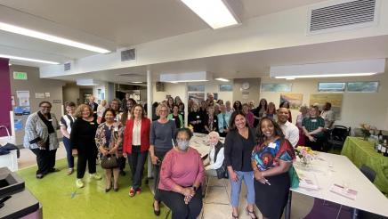 Asm. Addis at the Gathering for Women - Monterey's open house, surrounded by inspiring women who are making a meaningful impact in our community