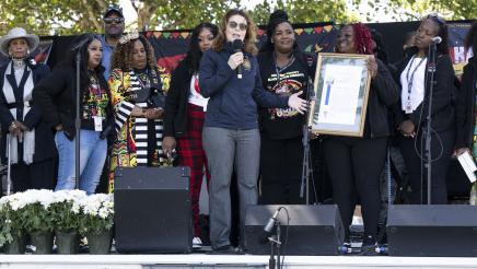 Asm. Addis presenting award onstage
