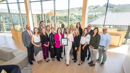 Group photo of Asm. Addis, Dr. Swick and Ohana staff