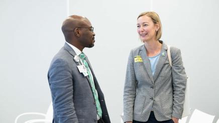 Asm. Addis speaking with Ohana staffer