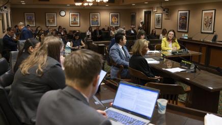 Wide view of Asm. Addis, committee members and audience