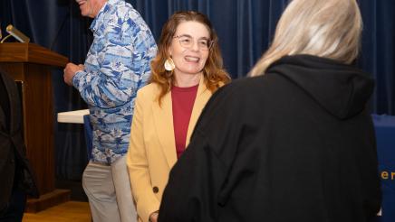 Asm. Addis speaking with attendee