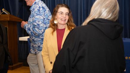 Asm. Addis speaking with attendee