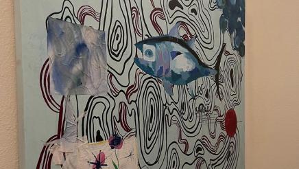 Large painting hanging on wall