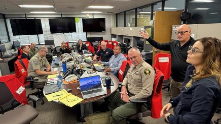 Asm. Addis in meeting room with Sheriffs