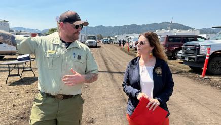Asm. Addis speaking with a U.S. Forest Service officer