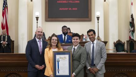 Asm. Addis and Speaker Rivas presenting Gabriel Pena with award